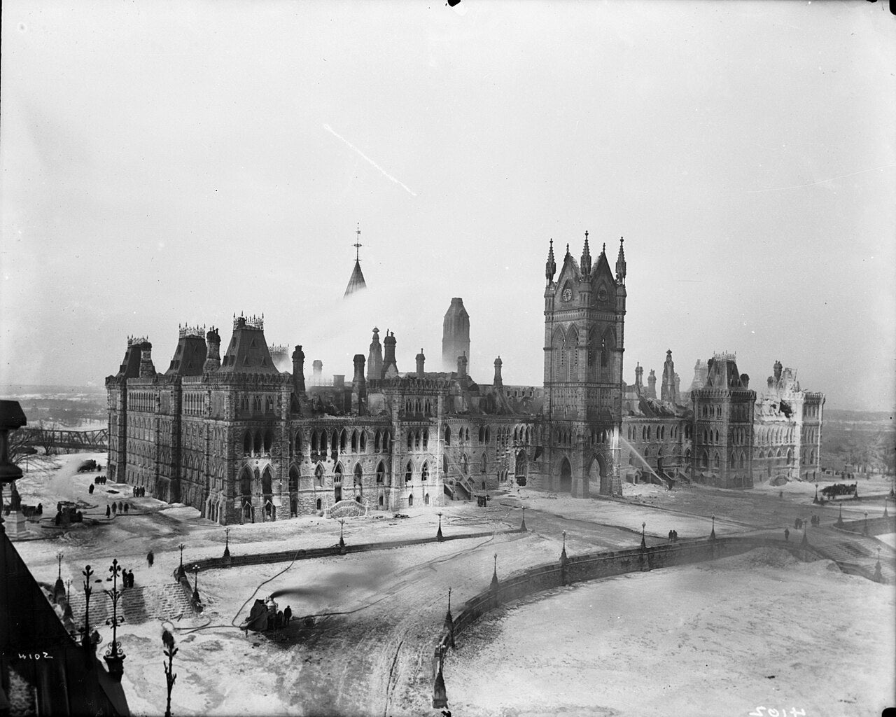 Snow and ice surround the ruined Centre Block in the aftermath of the February 1916 fire
