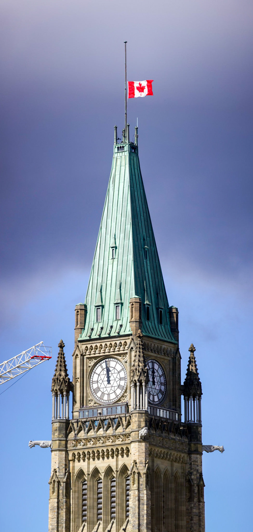 The Canadian flag, copper roof and Gothic stonework.